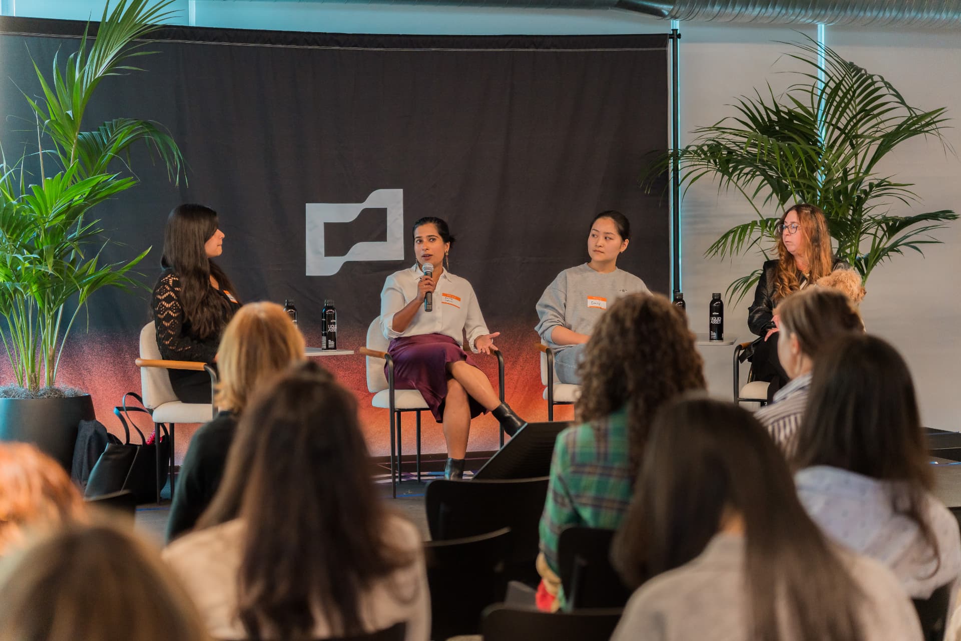 Panel discussion at a Women in AI event